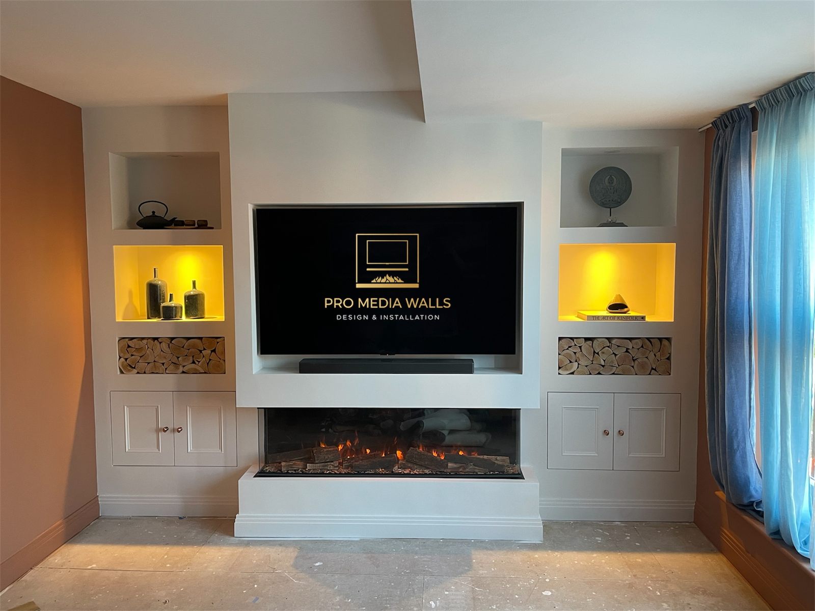 Luxury bespoke media wall with recessed television and integrated lighting
